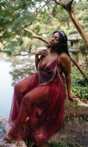 Black Fae Day, Black woman fairy on a river